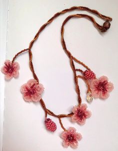 The one of a kind asymmetrical beaded cherry blossom necklace, 100% designed and hand-crafted by me! This 40 cm unique, artisan jewelry is meant to look exactly like the magnificent spring cherry blossom branches so you can wear one on your neck and look like an ethereal nymph! It is entirely made with premium quality miyuki glass beads that they are known to made exclusively in Japan and are considered one of the most refined, luxurious tiny beads in the world! You will not wear a simple necklace. This is a piece of art made with thought, care, love, and the highest quality materials. In the personalization section, you can type the length you prefer as well as your own adjustments regarding the style of the necklace. *Its piece is slightly different from the original one as this design i Pink Flower Pendant Necklace For Jewelry Making, Pink Beaded Necklace With Flower Pendant, Handmade Delicate Beaded Necklaces With Round Beads, Delicate Handmade Beaded Necklaces With Round Beads, Handmade Delicate Beaded Necklace With Round Beads, Pink Beaded Flower Pendant Jewelry, Pink Beaded Flower Pendant Necklace, Handmade Delicate Flower Beaded Necklaces, Handmade Delicate Flower Beaded Necklace