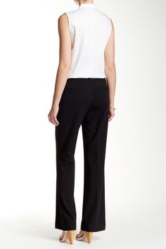 A wide leg trouser offers a modern option for your office attire with a mid-rise profile cut from solid suiting fabric. Zip fly with hook-and-bar/button tab closure. 2 front slant pockets. 2 back welt details. Classic fit. Lined. Approx. 9" rise, 33" inseam (size 2). Imported Modern Fitted Calvin Klein Bottoms, Fitted Wide Leg Career Bottoms, Stretch Work Pants With Welt Pockets For Office, Chic Straight Career Pants, Chic Career Straight Pants, Tailored Straight Leg Work Pants For Office, Elastane Wide Leg Pants For Business Casual, Chic Straight Leg Career Dress Pants, Sleek Tailored Wide-leg Dress Pants