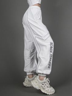 Features: It features loose sweatpants, high waist with elastic band, right hem with black zeous print decoration, reflective design.  Fabric: Polyester  Attention: This price includes a pair of sweatpants only, others are not included.  Size Chart(cm):   	 		 			Size(cm) 			S 			M 			L 		 		 			Waist 			56 			58.5 			61 		 		 			Hip 			107 			109.5 			112 		 		 			Sweatpants Length 			98 			99 			100 		 	   (Inevitable measurement error 2-3 cm.) White Hip Hop Parachute Pants With Pockets, White Cotton Hip Hop Parachute Pants, Hip Hop Sweatpants With Pockets For Gym, White Cargo Pants With Elastic Waistband For Streetwear, Sportswear Joggers With Cargo Pockets For Streetwear, Sportswear Bottoms With Side Pockets For Streetwear, Casual White Parachute Pants For Streetwear, Sportswear Bottoms With Side Pockets, White Hip Hop Cargo Pants For Streetwear