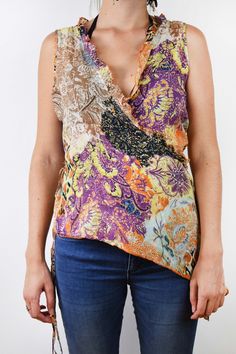 Floral asymmetrical blouse In great condition Tag: Labod Material: 68% cotton, 32% silk Size: Eu 42, medium, large bust 41 cm = 16 in length 56 cm = 22 in waist 40 cm =15,5 in Thank you for your visit! View more products: https://www.etsy.com/shop/VintageSeventhHeaven Feel free to contact me if you have any questions. Sleeveless Silk Beach Top, Fitted Multicolor Asymmetrical Top, Sleeveless Silk Tops For Beach, Sleeveless Silk Tops For The Beach, Orange Silk Tops For Spring, Orange Silk Top For Spring, Spring Orange Silk Top, Brown Silk Summer Tops, Brown Silk Tops For Spring