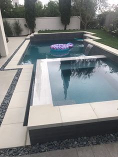 an empty pool in the middle of a yard