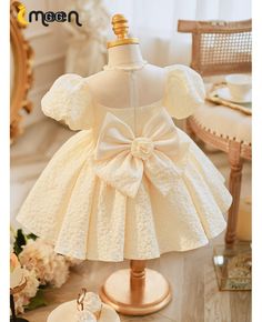 Get 10% off now! Buy champagne ruffled ballgown toddler flower girl dress with bubble sleeves at cheap price online. Free stable shipping and pro custom service since 2009. Elegant Spring Ball Gown For First Communion, Elegant Princess Dress With Ruffles For First Communion, White Puff Sleeve Dress With Ruffles For Wedding, Fitted Cream Princess Dress With Ruffles, Elegant Fitted Princess Dress With Puff Sleeves, Cream Princess Dress With Ruffles For Baptism, Short Sleeve Ruffled Princess Dress For Pageant, Fitted Cream Princess Dress, Cream Puff Sleeve Dress With Ruffles For Party