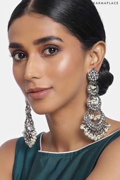 Now shop Chandbali Earrings at a reasonable price on the karma place website. #chandbaliearrings #chandbaligoldearrings #chandbaliearringsgold #goldchandbaliearrings #diamondchandbaliearrings #chandbaliearringssilver #chandbaliearringsonlineusa #chandbaliearringsingold #chandbaliearringsonline #chandbaligoldearringsonline #buychandbaliearringsonline #simplechandbaliearrings #bigchandbaliearringsonline #chandelierearrings #chandelierearringswedding #chandelierearringsdiamond #chandelierearrings Luxury Heavy Earrings For Festivals, Cheap Heavy Earrings For Festivals, Luxury Handmade Chandbali Bridal Earrings, Luxury Bridal Chandbali Earrings With Intricate Design, Luxury Chandbali Chandelier Earrings With Latkans, Luxury Jeweled Chandbali Chandelier Earrings, Luxury Festive Chandbali Chandelier Earrings, Cheap Chandbali Hoop Earrings For Festive Occasions, Affordable Chandbali Chandelier Earrings For Festivals