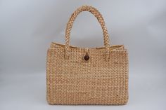 This is a high quality woven bag with Pu leather to use in a variety of ways, this can be a beach bag , summer bag  Detail++ Material: water hyacinth Closure: cream lining Approx size : Wide 5.5 inches Length 11.5 inches Height 8.5 inches SHIPPING: We Ship from Thailand and will be SHIPPED via THAI AIRMAIL and had TRACKING No. and Delivery Time 1-2 weeks to reach you Thank You ♥ NORNOR Braided Rattan Crochet Bag Rectangular, Braided Rattan Crochet Rectangular Bag, Rectangular Braided Bag From Natural Fiber, Rectangular Braided Bag In Natural Fiber, Everyday Rectangular Braided Beach Bag, Rectangular Braided Straw Bag, Everyday Rectangular Braided Straw Bag, Everyday Braided Rectangular Straw Bag, Rectangular Braided Natural Fiber Bag