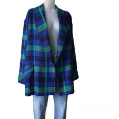 Gorgeous 1980s vintage feminine light wool coat, in a beautiful blue-green checkered pattern Perfect for late winter, spring or autumn  High quality, made in Germany Size approximately: L-XL  * mannequin is a size S/M and about 180 cm tall * looks great oversized Please check the measurements to make sure it will fit as you wish :  Length: 80 cm // 31.5 '' Shoulder to shoulder seam: 51 cm // 20 '' Sleeve length: 60 cm // 23.6 '' Armpit to armpit: 65 cm // 25.6 '' Waist: 61 cm // 24 '' Material: Vintage Feminine, Green Checkered, Cultural Events, Checkered Pattern, 1980s Vintage, Wool Jacket, Wool Coat, Beautiful Blue, Looks Great