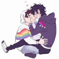 two people are hugging each other and one person is wearing a rainbow shirt, the other has