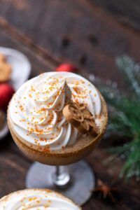 two dessert cups with whipped cream on top