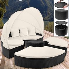 an outdoor furniture set on a deck with mountains in the background