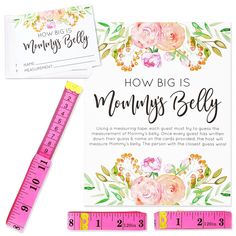 how big is mommy's belly? with pink flowers and ruler next to it