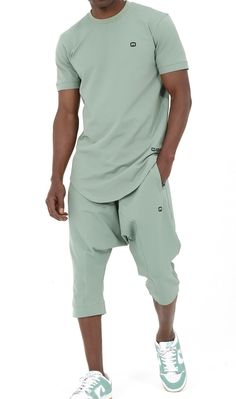 QL Relaxed Fit Nautik Set in Almond Green Description:Enjoy the warmth of summer with a fresh new look! This T-shirt and shorts set offers comfort, functionality and style. Featuring a shirt with a round neck and a stylish round hem and a three-quarter shorts that lets you enjoy the sun while keeping covered. This holiday wardrobe is all you need to feel at your best this season. Modern Islamic clothing for men Very high-quality fabric from top brands Short sleeved T-shirt with a small logo on the left chest Shorts with two zipped side pockets and elastic waist Modest Fashion Compliant (Halal Compliant) Details: Materials: 50% cotton; 40% polyester; 10% elastane Style: Casual, Sportswear and Events Care Tips: Wash at 30° Modern Islamic Clothing, Thank You Sister, Relaxed Trousers, Vans T Shirt, Urban Lifestyle, Islamic Clothing, Holiday Wardrobe, Enjoying The Sun, T Shirt And Shorts