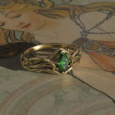 This Art Nouveau Moon themed engagement ring is made from recycled gold and is handmade with a comfort fit to your size. Perfect for the nature lover.  To see our entire Celestial collection, click here: https://www.etsy.com/shop/MetalWendler?ref=seller-platform-mcnav&section_id=50265844 To see variations on this design, click here: https://www.etsy.com/shop/MetalWendler?ref=seller-platform-mcnav&search_query=marquise+moon Ring Specs: ● 7x3.5mm Marquise Lab Emerald, ~0.3ct (Cut weight varies slightly). ● Metals: Silver or gold. This ring is available with different metals, message me about your idea.  ● Widest point of ring is 9.2mm at the top, and tapers down to about 1.8mm at the back.  ● Sizing: It is important for gold that you provide your EXACT finger size. Each ring is handmade to y Elven Engagement Ring, Fantasy Wedding Rings, Elf Ring, Moon Engagement Ring, Rpg Icons, Engagement Ring Marquise Cut, Engagements Rings, Elven Ring, Art Nouveau Engagement Ring