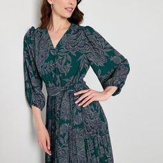 Made from a soft woven blend, this Ryegrass women's floral-print midi dress is perfect for the office or a gathering. It has a wrap v-neckline, 3/4 raglan sleeves, a waist tie and a pleated skirt. Wear it with flat or wedge sandals.Features: Tie-WaistClosure Type: ElasticNeckline: V NeckSleeve Length: 3/4 SleeveSleeve Style: Raglan SleeveApparel Length: 50 Inches - FrontDress Length: Midi LengthFiber Content: 100% PolyesterFabric Description: WovenLining Material: PolyesterCare: Machine WashCou… Elegant Printed Mid-length Midi Dress, Elegant Printed Midi Dress, Green Flowy Midi Dress For Work, Spring Midi Dress With 3/4 Sleeves And Print, Floral Print 3/4 Sleeve Midi Dress For Fall, Floral Print Midi Dress With 3/4 Sleeves For Fall, Spring Printed Maxi Dress For Workwear, Floral Print Fall Midi Dress With 3/4 Sleeves, Printed Maxi Dress For Workwear In Spring