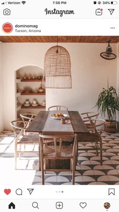 an instagram photo of a dining room table and chairs with food on the table