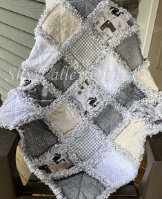 a blanket that has been made to look like it is sitting on top of a chair