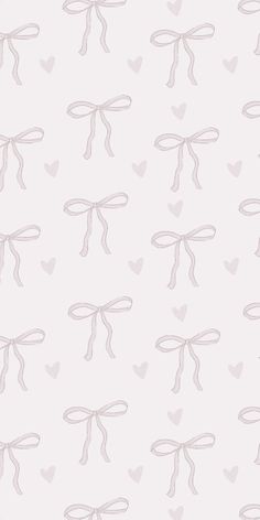 a white wallpaper with hearts and bows on the bottom, in shades of gray