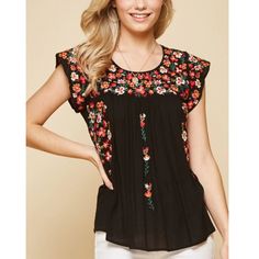 Add A Pop Of Color To Your Wardrobe With Our Women’s Blouse, Featuring A Delicate Round Neckline And Vibrant Embroidery That Exudes Charm. The Flutter Sleeves Add A Playful, Feminine Touch, Making This Top Perfect For Casual Outings Or Dressy Occasions. The Intricate, Colorful Embroidery Creates A Beautiful Contrast, Elevating The Overall Look. Pair This Lightweight And Stylish Blouse With Jeans Or Skirts For An Effortlessly Chic Outfit That’s Both Comfortable And Eye-Catching. New With Tags. Black Ruffle Top With Butterfly Sleeves, Black Ruffled Top With Butterfly Sleeves, Black Butterfly Sleeve Top With Ruffles, Black Embroidered Summer Blouse, Black Embroidered Top For Spring, Chic Floral Embroidered Top, Spring Floral Print Embroidered Top, Chic Black Tops With Floral Embroidery, Summer Floral Embroidery Blouse With Flutter Sleeves