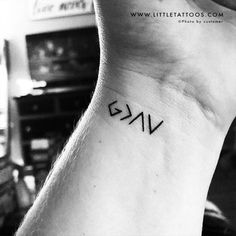 a black and white photo of a person's wrist with the word swv on it