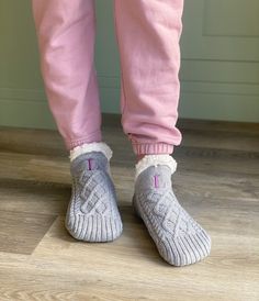 For the ultimate in cosy comforts, try our sherpa lined knitted ankle slipper socks. Whether you're snuggled up by the fire with your favourite book or enjoying a slumber party with your besties,our socks make the ideal finishing touch to your loungewear looks. Available in 3 colours with a classic cable knit design, our new shorter style socks will take you through the winter months in style. A cute alternative to traditional slippers, the non-slip sole will keep you feeling secure when walking on wood or tiled floors and the soft sherpa lining makes them extra cosy on chilly days at home. We have 3 sizes available in this unisex style making them suitable for the whole family. When you place your order choose the sock colour you'd like from the drop down menu along with whether you'd lik Cozy Snug Gray Socks, Cozy Gray Comfortable Socks, Cozy Non-slip Socks For Indoor Use, Cozy Non-slip Indoor Socks, Pyjama Party, Style Socks, Bed Socks, Knitted Slippers, Slumber Parties