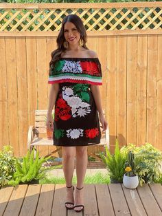 -This Beautiful Off the Shoulder Mexican Dress is the perfect dress for a special event. - It's comfortable and cute with elastic around the shoulder and a tie on the back for an adjustable fit. - Has lace trim. The Jewelry modeled may be purchased separately in this link: https://www.etsy.com/es/listing/884724796/filigrana-chapa-de-oro-filigrana-clasica?ref=shop_home_active_3&pro=1&frs=1 Black Dresses For Cinco De Mayo Fiesta, Multicolor Dress For Cinco De Mayo Fiesta, Traditional Black Dress For Cinco De Mayo, Fitted Multicolor Dress For Cinco De Mayo, Fiesta Fitted Floral Print Dress, Embroidered Multicolor Dress For Garden Party, Multicolor Floral Print Dress For Fiesta, Multicolor Fiesta Dresses, Fitted Bohemian Dress For Holiday