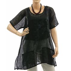 Ready to ship. Very beautiful, stylish linen tunic - this piece is seasonless and you can wear it all year round. A-line shape, 1/2 batwing sleeves, round neck, sideslits and two pockets at the front. Black fine, soft linen gauze - all around bordered with black linen ribbon. Decorated with charming falling leaves appliqués. Very nice for everyday wear, for your holiday - but also for a party or for going out. Great and very fine linen fabric - becomes ever softer and beautiful with time. There Casual Black Linen Beach Dress, Casual Black Linen Vacation Dress, Black Lagenlook Tops For Summer, Black Bohemian Linen Summer Dress, Black Bohemian Linen Dress For Summer, Black Short Sleeve Tunic For Summer, Black Short Sleeve Summer Tunic, Black Bohemian Linen Dress, Casual Black Tunic For Vacation