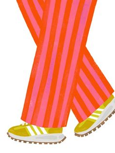 the legs and feet of a person in striped pants with yellow sneakers on top of them