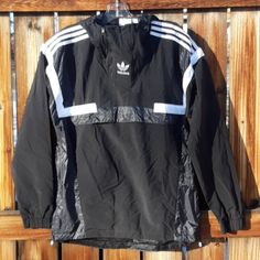 Brand New With Tags Adidas Black Windbreaker Jacket Mens Size Small 2 1/4 Zippers On Top Mesh Lined Interior Has Zippers On Sides Of Jacket Black Half-zip Techwear Windbreaker, Black Half-zip Windbreaker For Outdoor Activities, Black Half-zip Urban Windbreaker, Black Urban Half-zip Windbreaker, Adidas Long Sleeve Windbreaker For Winter, Adidas Winter Windbreaker With Long Sleeves, Adidas Urban Long Sleeve Windbreaker, Adidas Sportswear Windbreaker For Streetwear, Black Half-zip Winter Track Jacket