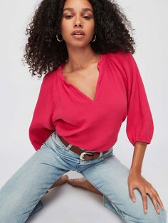 A modern version of the peasant style top in effortless, breezy Double Gauze. Elastic at 3/4 length voluminous sleeve. Raw hem. (This one comes in Hibiscus.) | Women's Mimi Blouse Top in Hibiscus | Ethical Essentials Daywear Tops With Blouson Sleeves And 3/4 Sleeve, Daywear Tops With Blouson 3/4 Sleeves, Bohemian Balloon Sleeve Tops For Summer, Feminine 3/4 Sleeve Blouse For Daywear, Flowy Half Sleeve Casual Tops, Bohemian Half Sleeve Tops For Day Out, Casual Flowy Half Sleeve Tops, Spring Blouse With Blouson Sleeves And 3/4 Length, Bohemian Balloon Sleeve Tops For Brunch