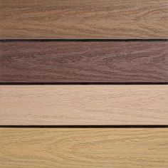 wood flooring samples stacked on top of each other with different colors and finishes in them