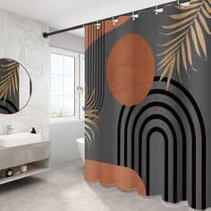 a bathroom with a shower curtain that has an orange and black design on the outside