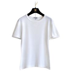 Check out this item from 1stdibs! Chanel Vintage S/S1994 White Cotton Scalloped CC Logo 94P T-Shirt: https://www.1stdibs.com/id-v_20396502 Classic Summer Tops With Embroidered Logo, Classic Tops With Embroidered Logo For Summer, Chanel Tshirt, 1stdibs Chanel, Chanel T Shirt, Chanel Spring Summer, Chanel Top, Chanel Shirt, Chanel Spring