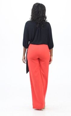 "An Ashanis Exclusive! The Cora orange salmon high waist and wide leg pants are just in time for summer! Fitted through waist and hips. Length: 45\" Rise: 12\" Inseam: 33\" Model is 5ft 7\" and wears a Medium" African Jumpsuit, Salmon Orange, Ankara Tops, Orange Salmon, African Head Wraps, Patches Fashion, Womens Pants, Style Maxi Dress, Top Photo