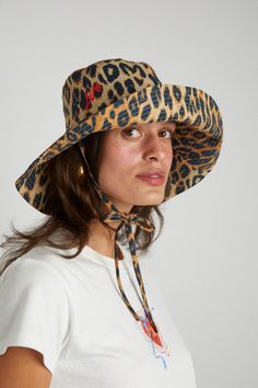 Our Damson Madder sun hat is a classic bucket hat shape with wide brim. It features a tie neck and and leopard print design with contrasting red DM embroidery. •One size - 57cm circumference •Made from 100% organic cotton •Features classic DM Leopard print •Made in India Damson Madder, Flower Scrunchie, Mad Hat, Soft Hats, Scarf Yarn, Quilted Backpack, Skirt Co Ord, Pink Gingham, Black Friday Shopping