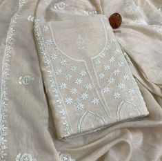 Item Overview ATHARVA Hand Embroidered Lucknowi Work Chanderi Shirt/Beige/Bootis on back/Hand Work Chanderi Dupatta/Custom Stitch Unstitch/Gift/ Dno. LUCK15 Fabric: * Shirt: Chanderi Silk- Lucknowi Chikankari Embroidery on Neck and All over Jaal/Bootis on the Back 2.5 Mts Beautiful Hand Embroidery * Dupatta: Chanderi Embroidery Dupatta 2.5Mts/All over Embroidery/ Lucknowi Chikankari * Bottom Santoon Silk 2.5 Mts. *Anarkali Style - - Increased Embroidery All Over the Panel -4.5Mts to 5 Mts Shirt Indian Ladies Dress, Lucknowi Embroidery, Patiala Salwar Kameez, Chanderi Dupatta, Chikankari Suits, Lucknowi Chikankari, Patiala Salwar, Embroidered Pants, Beautiful Suit