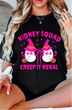 a woman wearing a black t - shirt that says kidney squad creepy rental