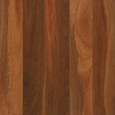 a close up view of the wood grains on this flooring material, which is very dark brown