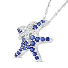 Honor motherly love in a whimsical way when you surprise Mom with this sweet blue and white lab-created starfish pendant in silver. Crafted in sterling silver The mama starfish glistens with graduated-size bright blue lab-created sapphires along her arms. Her baby - adorned with graduated-size white lab-created sapphires - shimmers atop to complete this playful look. This pendant suspends slightly askew along an 18.0-inch rope chain that secures with a spring-ring clasp. Ocean-inspired Sterling Silver Jewelry With Starfish Charm, Ocean-inspired Sterling Silver Starfish Jewelry, White Star-shaped Jewelry With Starfish Charm, Elegant Blue Starfish Charm Jewelry, Elegant Blue Jewelry With Starfish Charm, White Starfish Pendant Ocean-inspired Jewelry, White Star-shaped Ocean-inspired Jewelry, Ocean-inspired White Star-shaped Jewelry, Ocean-inspired White Star Jewelry