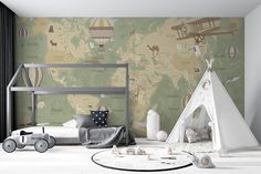 a child's bedroom with a map wallpaper and teepee tent