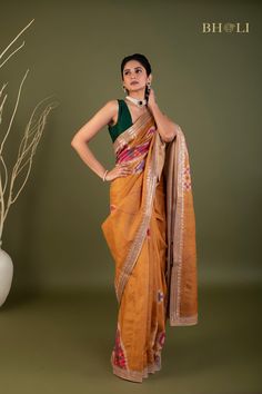 This exquisite handloom tussar silk saree features intricate gota and pearl work, handcrafted with precision and care. The digitally printed design adds a modern touch to this traditional piece, while the soft and flowy fabric ensures comfort and elegance. The perfect choice for those seeking a smart and contemporary saree. Navratri Slub Silk Pre-draped Saree With Gota Work, Diwali Slub Silk Saree With Gota Work, Traditional Slub Silk Blouse Piece With Gota Work, Designer Slub Silk Saree With Gota Work, Slub Silk Saree Blouse Piece With Gota Work, Unstitched Slub Silk Saree With Gota Work, Bollywood Style Tussar Silk Traditional Wear With Gota Work, Diwali Tussar Silk Traditional Wear With Gota Work, Navratri Tussar Silk Pre-draped Saree With Gota Work