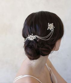 a woman wearing a bridal hair piece