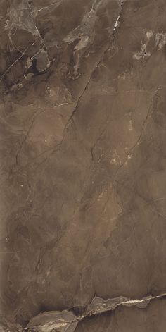 an aerial view of the desert with brown and white paint on it's walls