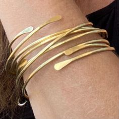 "This listing is for 5 BANGLES ♥ These bangles have been created using thick brass that has been hammered throughout and flattened at the ends and formed into a bangle for a classic, rich look. (second picture shows just one bangle) These bangles are available in these sizes SMALL-2 1/4\" MEDIUM-2 1/2\" - MOST COMMON SIZE LARGE-2 3/4\" Thank you for visiting StoneDelite and please come again! CHECK IT OUT Featured in.... Couture Goes Corporate... http://www.couturegoescorporate.com/1/post/2013/0 Prom Jewellery, Natural Gamine, Stacking Bangles, Modern Silver Jewelry, Unique Bangle, Stackable Bangles, Brass Bangle, Bangles Making, The Bangles