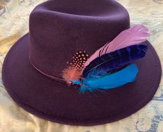 This is a beautiful rich purple fedora comes with feathers in rich vibrant colors Ready to ship item SiZe 56 - 58 cm small to medium head Feel free to contact us with questions Has leather string band Purple Feathered Hat For Kentucky Derby, Purple Fedora Winter Hat, Adjustable Purple Hat With Feathers, Old Bed Frames, Pretty Poodles, Mens Hat, Purple Feather, Hat Storage, Rich Purple