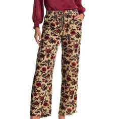 Johnny Was Jade Vic Easy Pants Rosalita Red L Description: These Colorful, Flattering And Fun Jade Vic Floral Velvet Pants By Johnny Was, Are Comfortable Soft, Luxurious Velvet Fabric With An Elastic Waistband. Drawstring. Slant Pockets. Wide Leg. Size: L Color: Gold/Red Floral Material: 82% Rayon/ 18% Silk Waist: ~ 18 Inches Inseam: ~30 Inches Floral Velvet Pants, Spring Wide-leg Pants With Paisley Print, Embroidered Leggings, Spring Paisley Print Wide-leg Pants, Elastic Waist Leggings, Tie Waist Pants, Printed Sweatpants, Color Block Leggings, Legging Fits