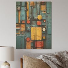 an abstract painting on the wall above a bed