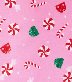 a pink background with candy canes and snowflakes on it's surface