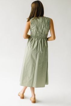 Get ready to turn heads in The Laserna Tie Detail Midi Dress in Sage! This stunning dress features a unique tie detail that adds a touch of elegance to the classic midi style. Perfect for any occasion, this dress will make you feel confident and stylish. Don't miss out on this must-have piece for your wardrobe! Details self/lining: 100% cotton Fabric Care Guide Here Sizing & Fit Measurements are approximate and taken while laying flat across the front. Not doubled. small: bust = 18"; waist = 14" Unique Ties, Nursing Friendly, Large Bust, Wide Leg Jumpsuit, Floral Maxi, Small Bust, Stunning Dresses, Pink Tops, Floral Maxi Dress