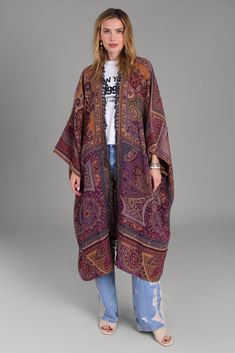 The Woven Bohemian Vintage Kimono is an exquisite piece that seamlessly blends vintage motifs with bohemian style. It boasts stunning floral elements woven into the design and fringe embellishments that cascade down the length of the garment, creating a playful and captivating movement. This kimono comes with a belt that cinches at the waist to accentuate your silhouette and allow for a personalized fit. Wear it loosely for a relaxed bohemian look, or cinch it tightly to enhance your figure. Mat Fashion Drapes, Cardigans Crochet, Vintage Motifs, Fashion Draping, Kimono Outerwear, Wedding Kimono, Scarf Sale, Bohemian Look, Floral Elements