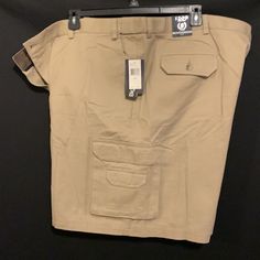 Nwt Izod Khaki Cargo Shorts Size 52 With Extender Waist. Rn16576 Flatfront Inseam 9" Khaki Bermuda Bottoms With Pockets, Khaki Bottoms With Pockets And Short Inseam, Khaki Shorts With Side Pockets, Casual Khaki Shorts With Welt Pockets, Khaki Shorts With Pockets, Utility Style Shorts With Welt Pockets, Khaki Cargo Shorts, Cargo Shorts, Mens Shorts