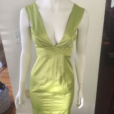 You Need This Dress! Brand New Roberto Cavalli Fitted, Midi Dress. From His "Just Cavalli" Collection. Vibrant Lime Green, Stretch Satin. Beautiful Tailoring, Empire Waist, Low Cut Front And Back. Stunning Color Chartreuse! Pics Do No Justice Head Turner See Last 2 Pics For Color Brand New Dress With Tags. Sold Out In Stores. Price May Go Up In Summer! Waiting For Perfect Buyer! Stand Out In A Sea Of Lbds At Your Next Event Size 4/6 Back Zip Closure Below The Knee Back Split Fitted Yellow Evening Dress, Yellow Lined Fitted Midi Dress, Yellow Fitted Midi Dress With Lining, Yellow Fitted Midi Dress, Lined, Yellow Fitted Lined Midi Dress, Yellow V-neck Midi Dress For Evening, Yellow Midi Mini Dress For Evening, Yellow Sheath Mini Dress For Evening, Yellow Sheath Mini Dress For Night Out