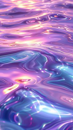 the water is very colorful and it looks like an abstract painting with blue, pink, purple